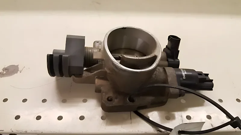 4591563AB Throttle Body - OEM | Fits 2001-2003 Chrysler Sebring (2.7L)