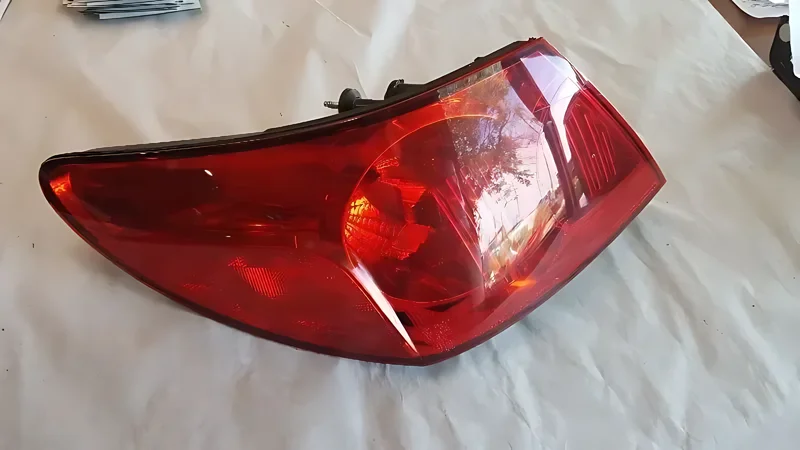 5113613AA Quarter Mounted Tail Light - OEM | Fits 2009-2010 Chrysler Sebring