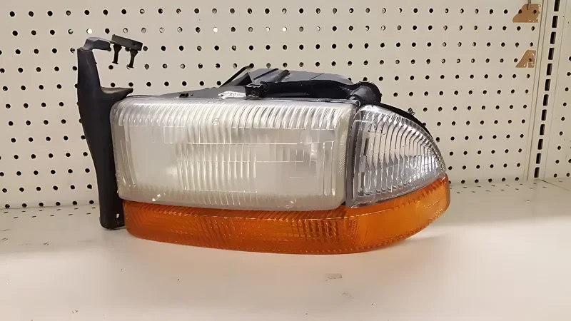 165849 OEM LH Headlamp With Side Marker Lamp - OEM | Fits 1998-2004 Dodge Dakota
